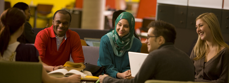 Hire a McMaster student! - Group of students at the library. 